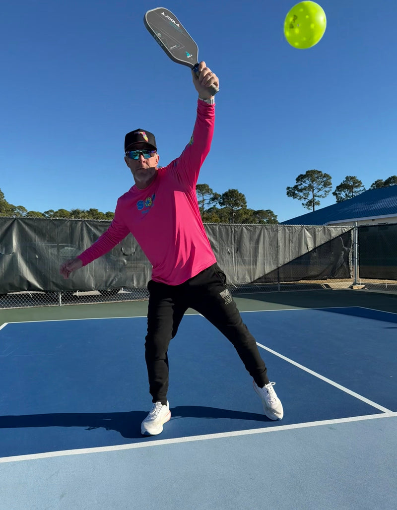 Ultra Performance Longsleeve in Hot Pink — front view on model showing athletic fit
